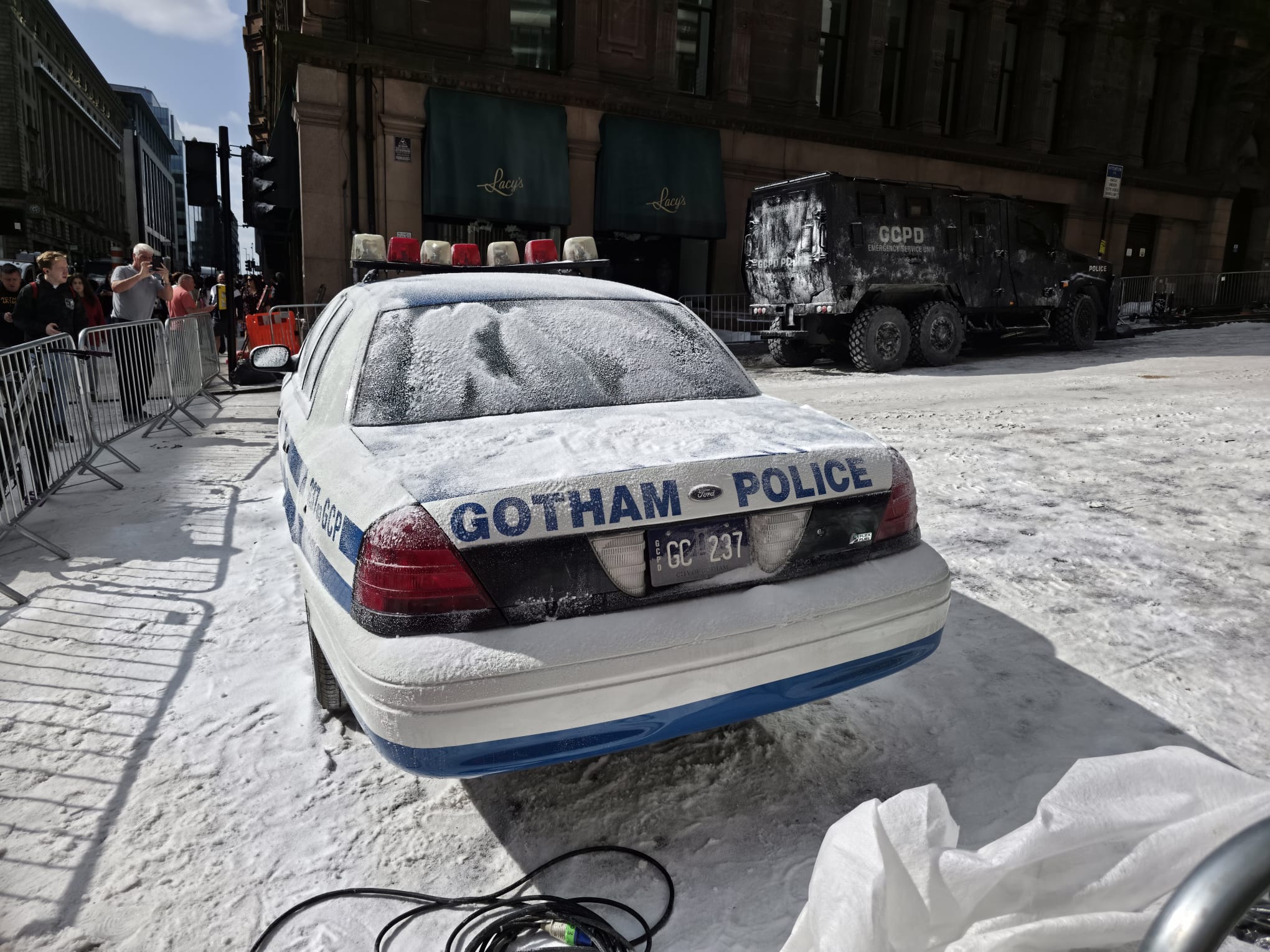 A snow-covered Gotham City Police car on a Glasgow street