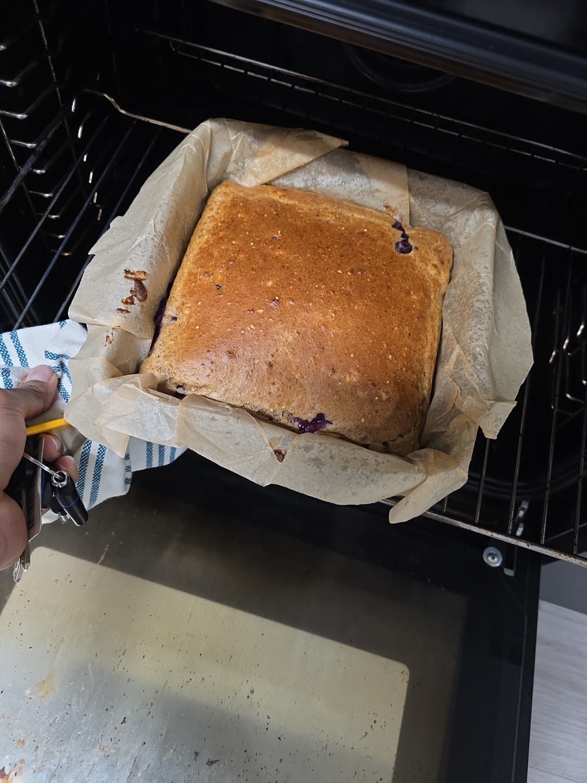 Freshly baked protein banana blueberry loaf in the oven